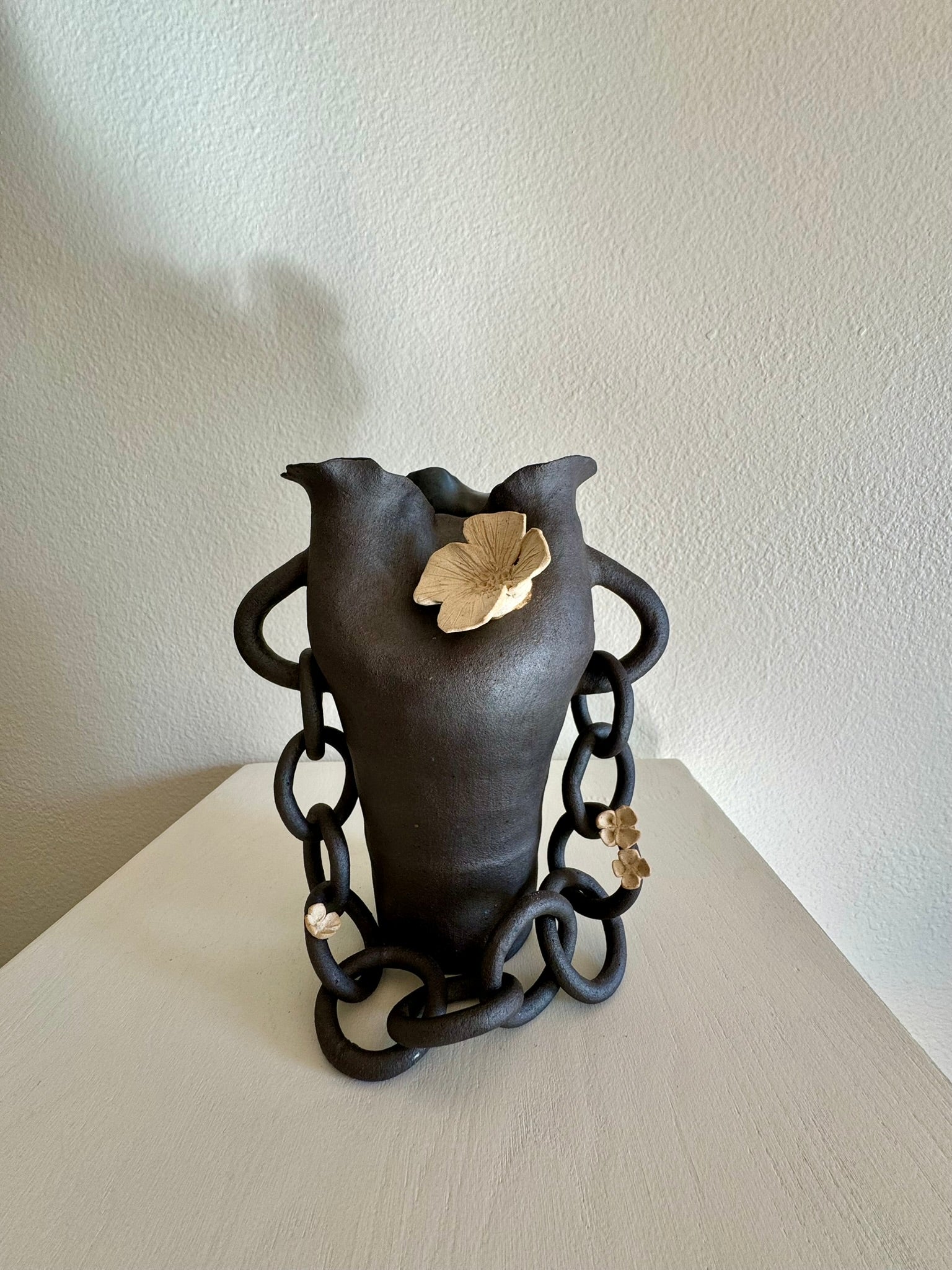 Dark Interlinked With Cream Applique Flowers