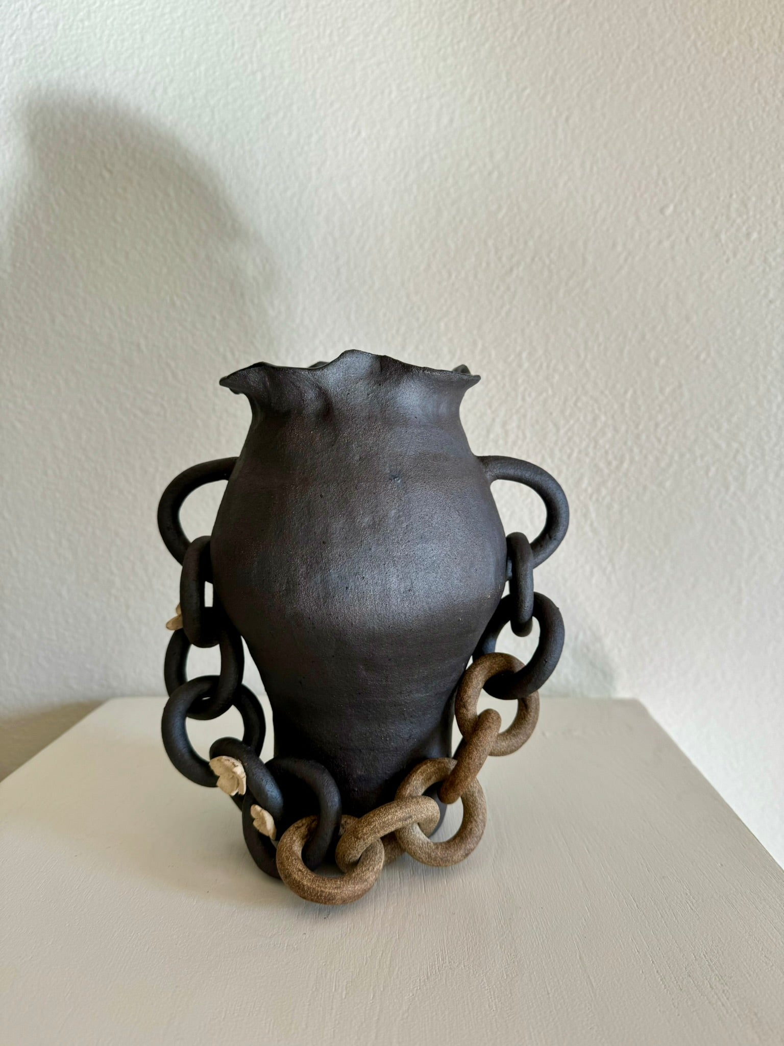 Dark Interlinked With Cream Applique Flowers